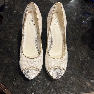 4’ high heels. Worn two times.